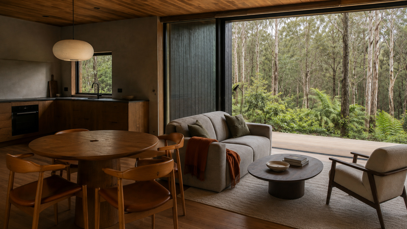 AI-generated Concept kitchen and dining connection with a round table, four timber chairs, one cream pendant, perimeter counter and the same grey living furniture.